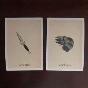 oracle cards with symbols knife and wing